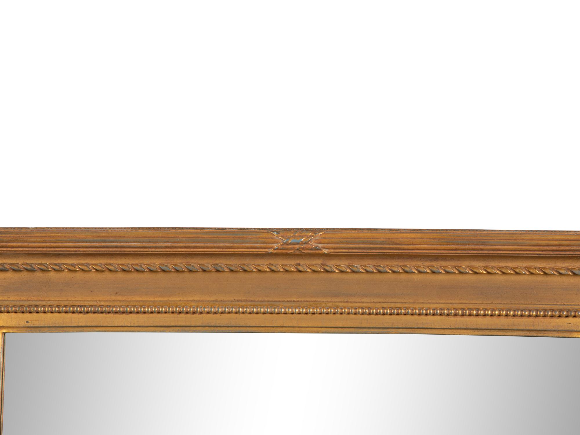 A Giltwood Framed Mirror — 20th Century