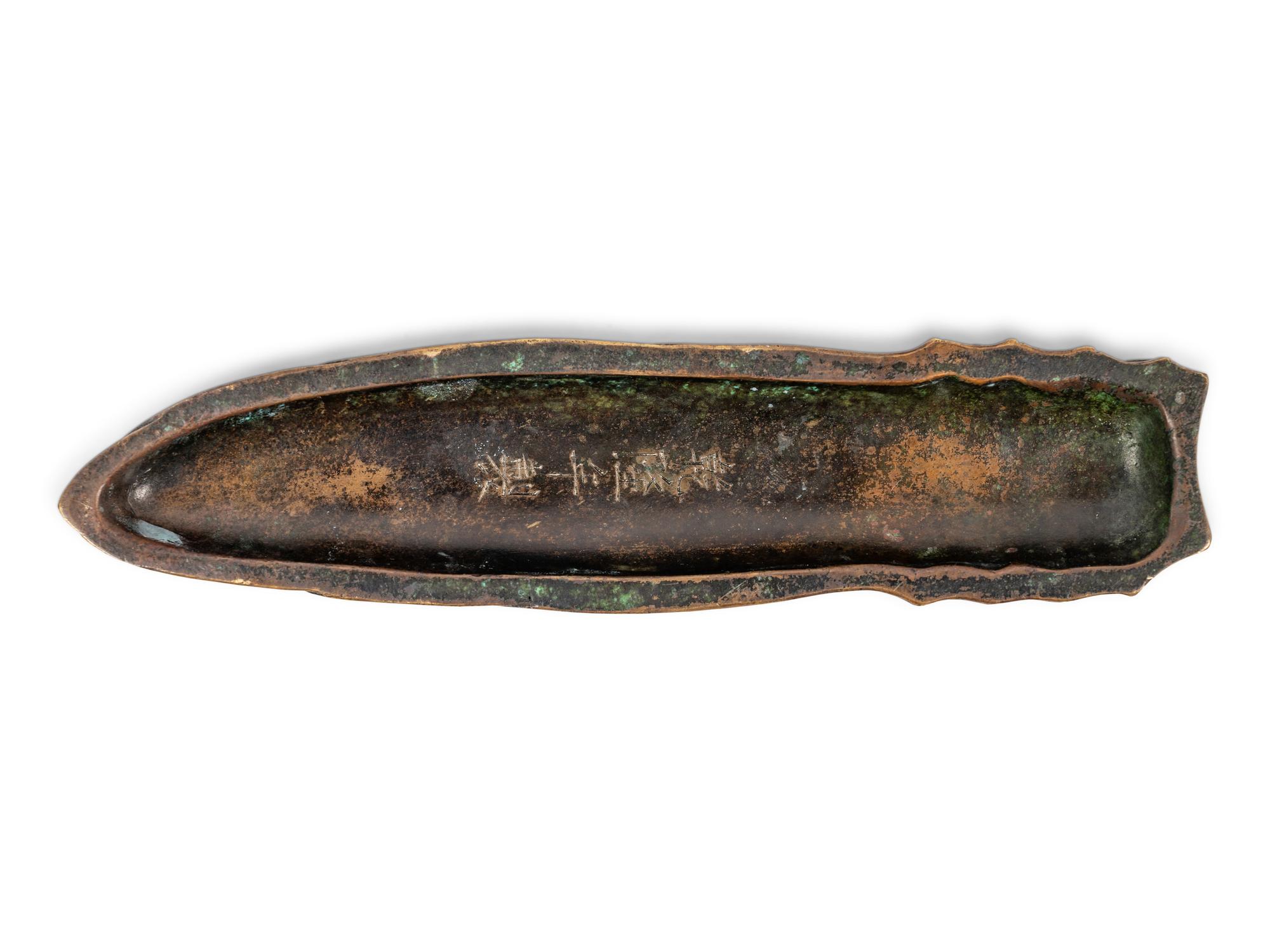 A Chinese Inlaid Bronze Bamboo Shoot-Form Paper Weight