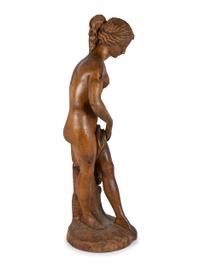 A Classically Inspired Carved Wooden Sculpture of a Standing Nude Female