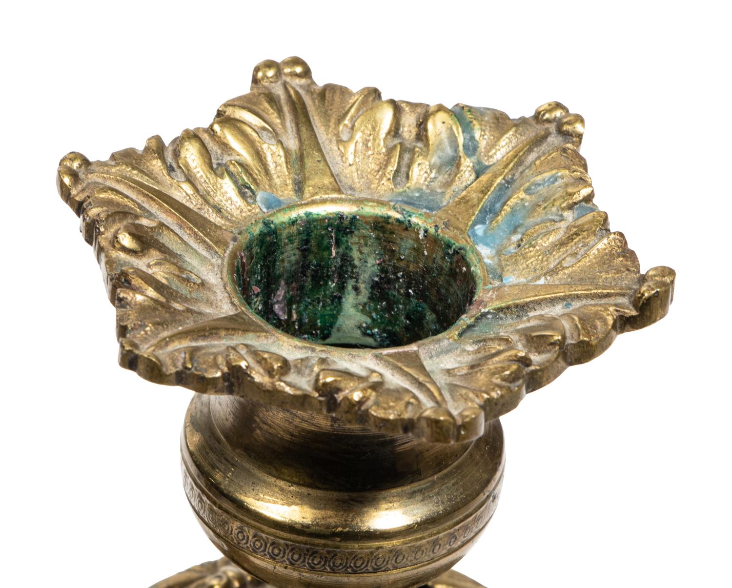 A Pair of Continental Gilt Metal Candlesticks