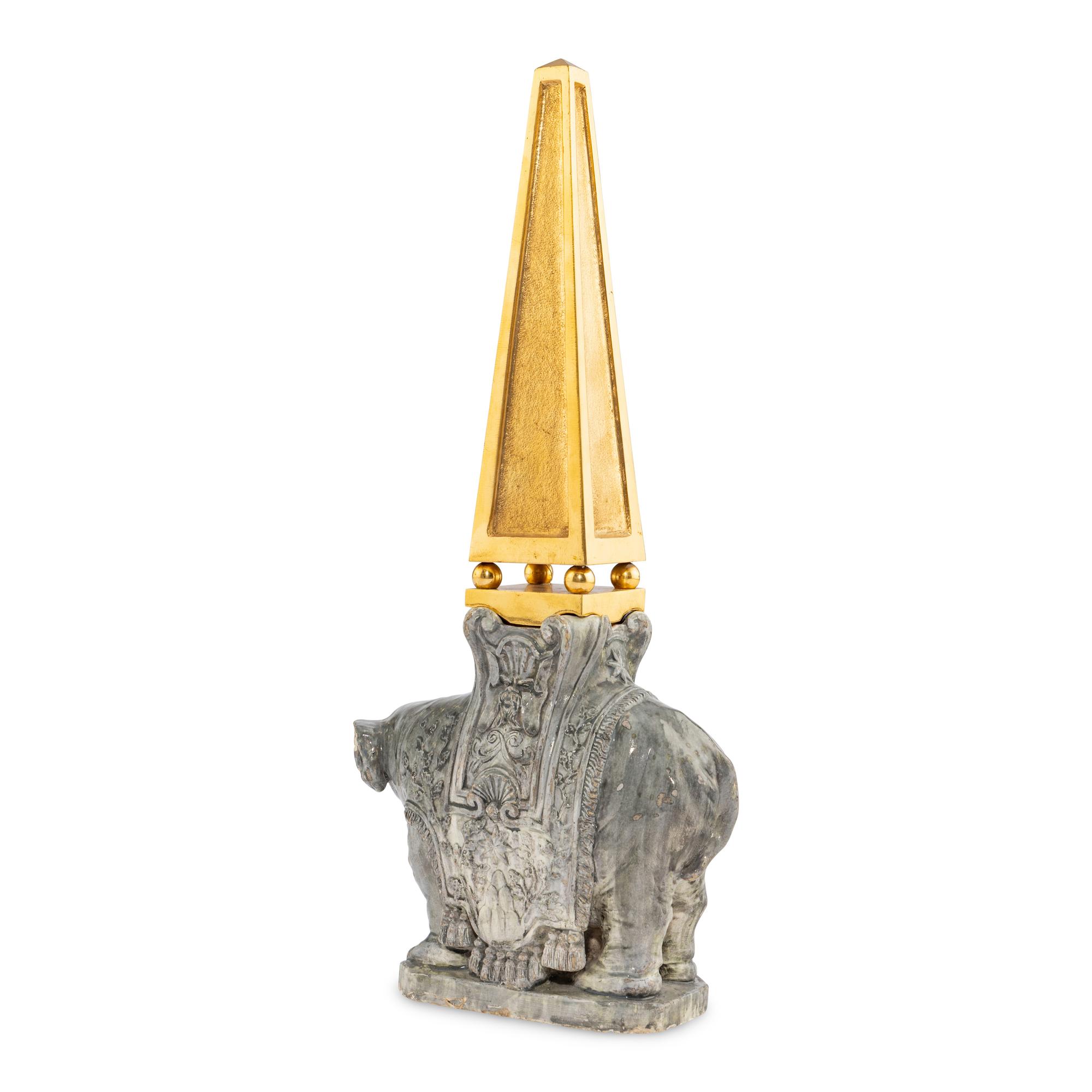 A Continental Gilt Bronze and Glazed Earthenware Elephant Obelisk