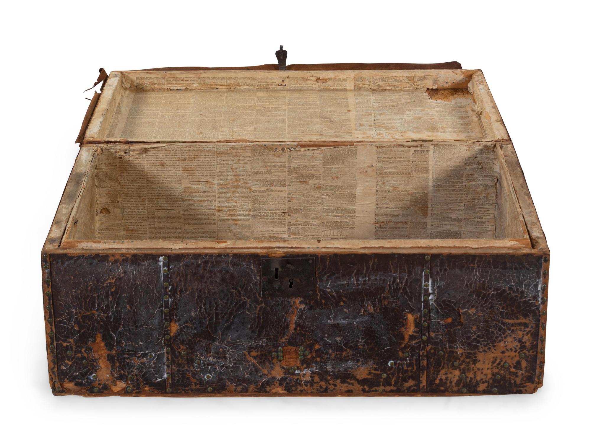 A Continental Nailhead Decorated Leather Trunk