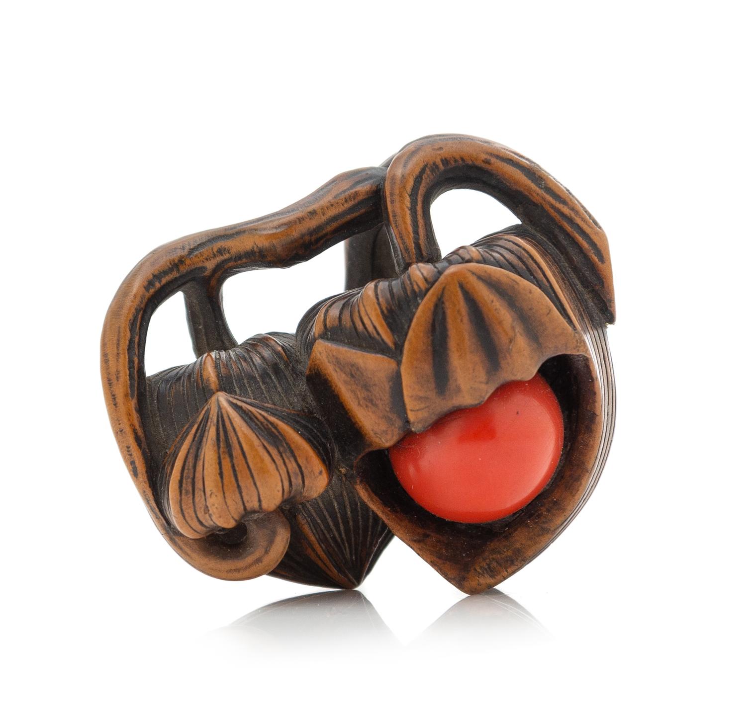 A Japanese Boxwood Netsuke Length 2 inches. — 19TH CENTURY