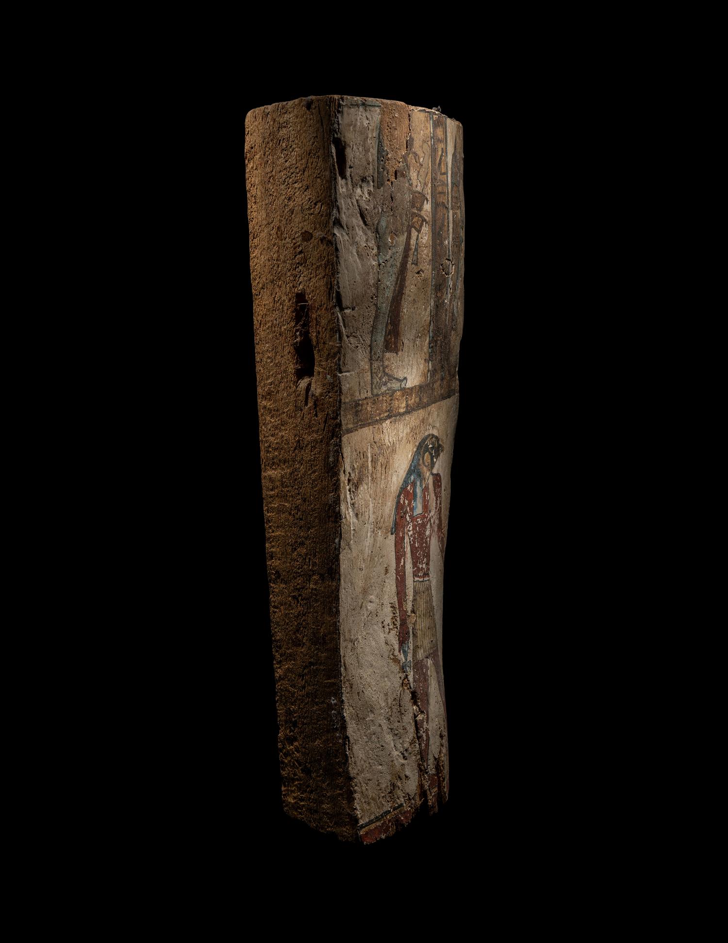 An Egyptian Painted Wood Sarcophagus Panel with the Sons of Horus