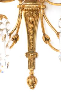 A Pair of Louis XVI Style Gilt Bronze and Cut Glass Nine-Light Sconces