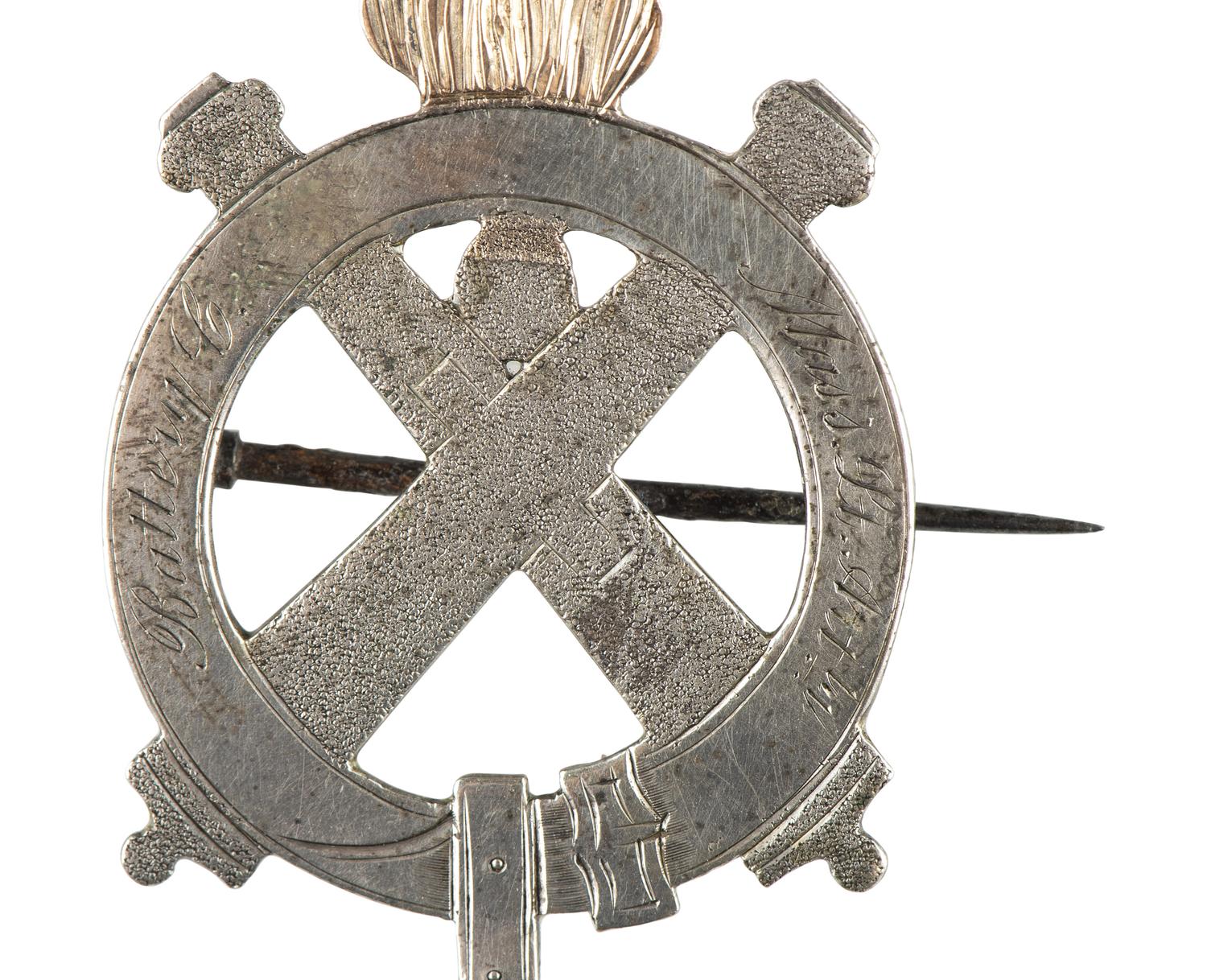 [CIVIL WAR]. Badge identified to Alfred J. Johnson, 1st, 3rd, and 5th Massachusetts Light Artilleries.