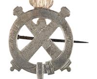 [CIVIL WAR]. Badge identified to Alfred J. Johnson, 1st, 3rd, and 5th Massachusetts Light Artilleries.