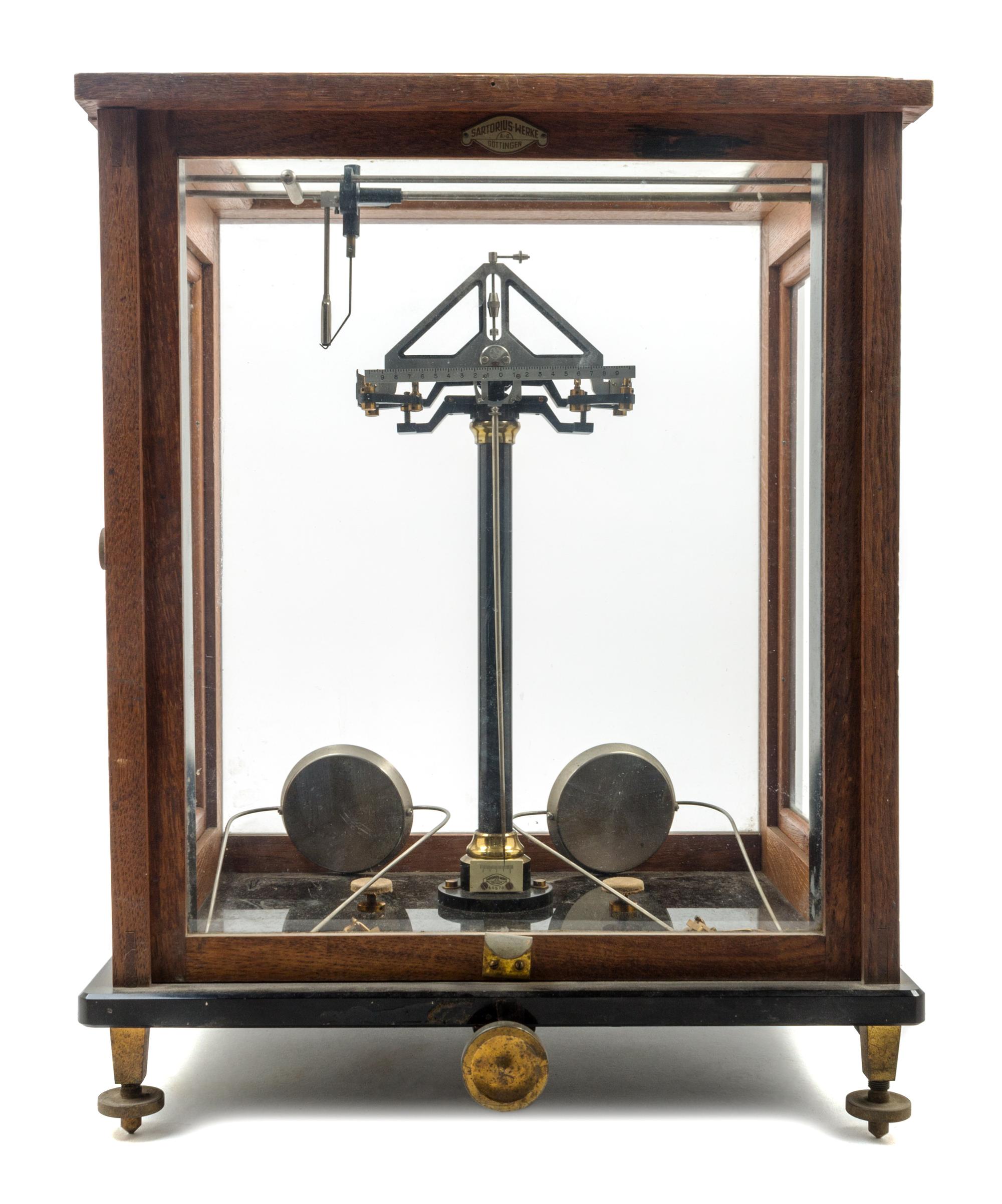 A German Oak Cased and Brass Assayer's Balance Height of case 19 1/4 x width 15 1/4 x depth 12 inches. — SARTORIUS-WERKE, GOTTINGER, 19TH CENTURY