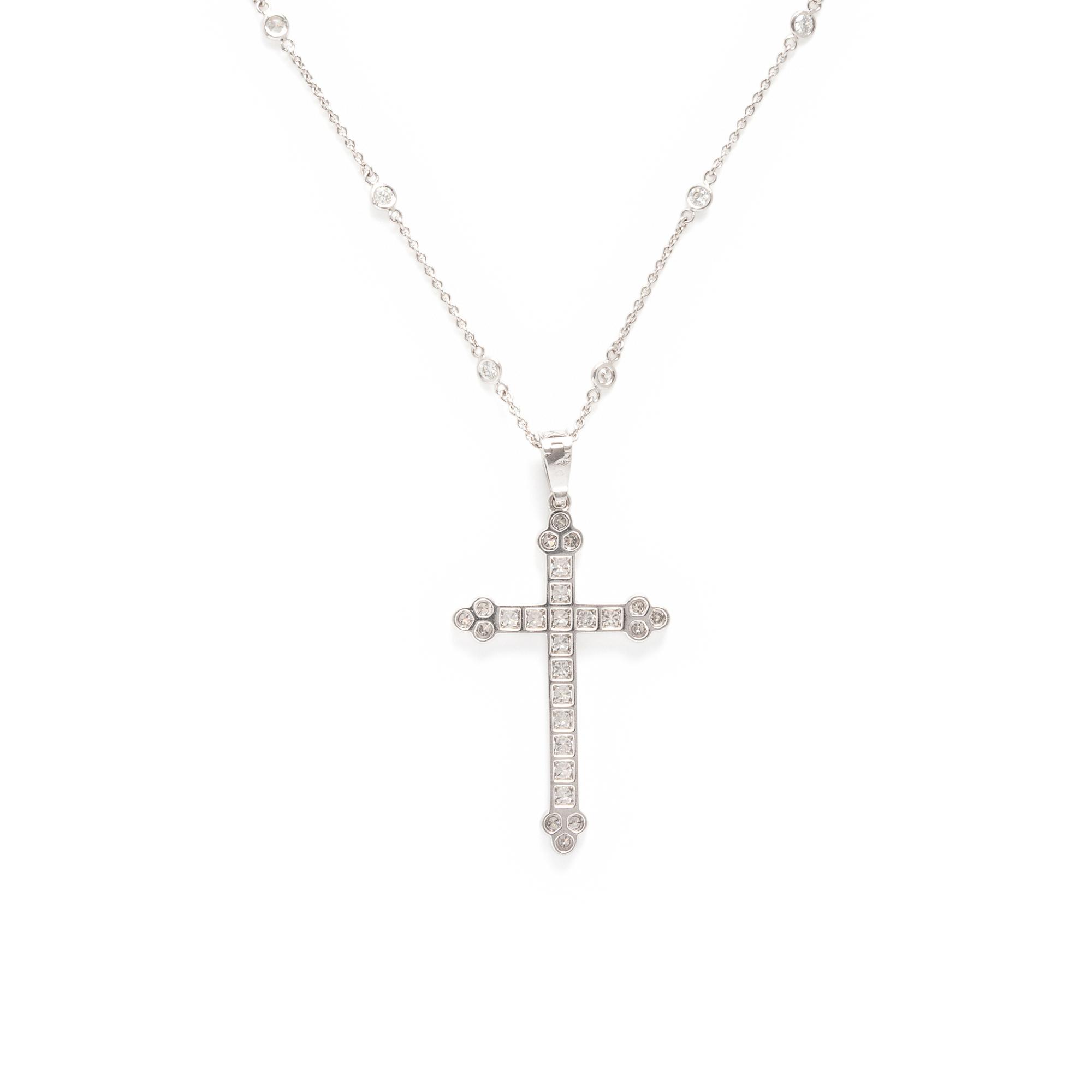 Cartier, Diamond and White Gold Cross Pendant with a Roberto Coin Diamond Station Chain Necklace