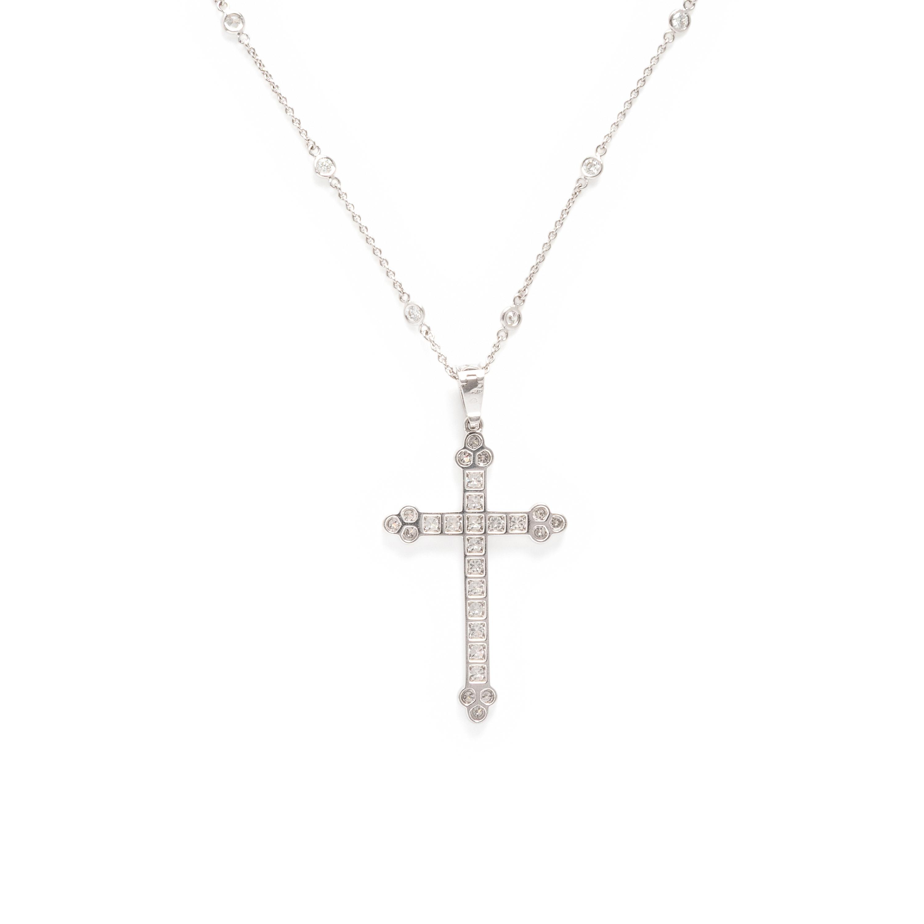 Cartier, Diamond and White Gold Cross Pendant with a Roberto Coin Diamond Station Chain Necklace