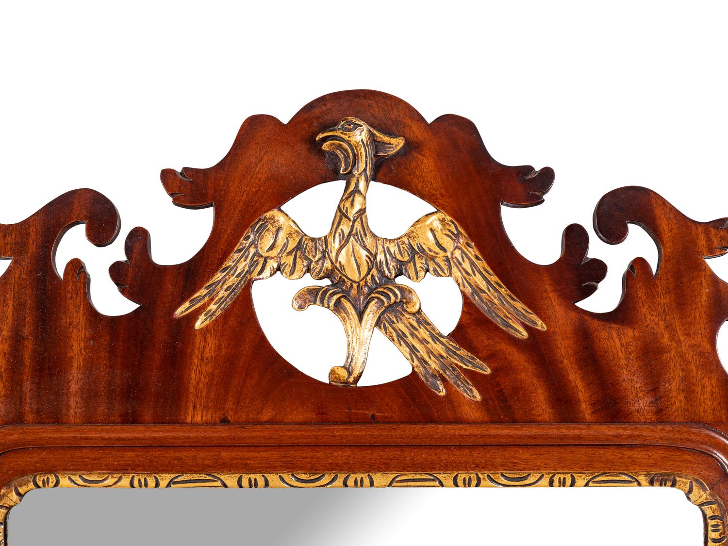 A George III Style Parcel Gilt Mahogany Mirror