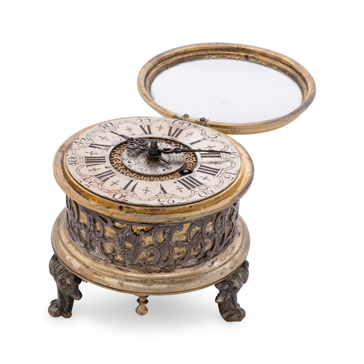 A German Gilt Metal and Silvered Brass Table Clock