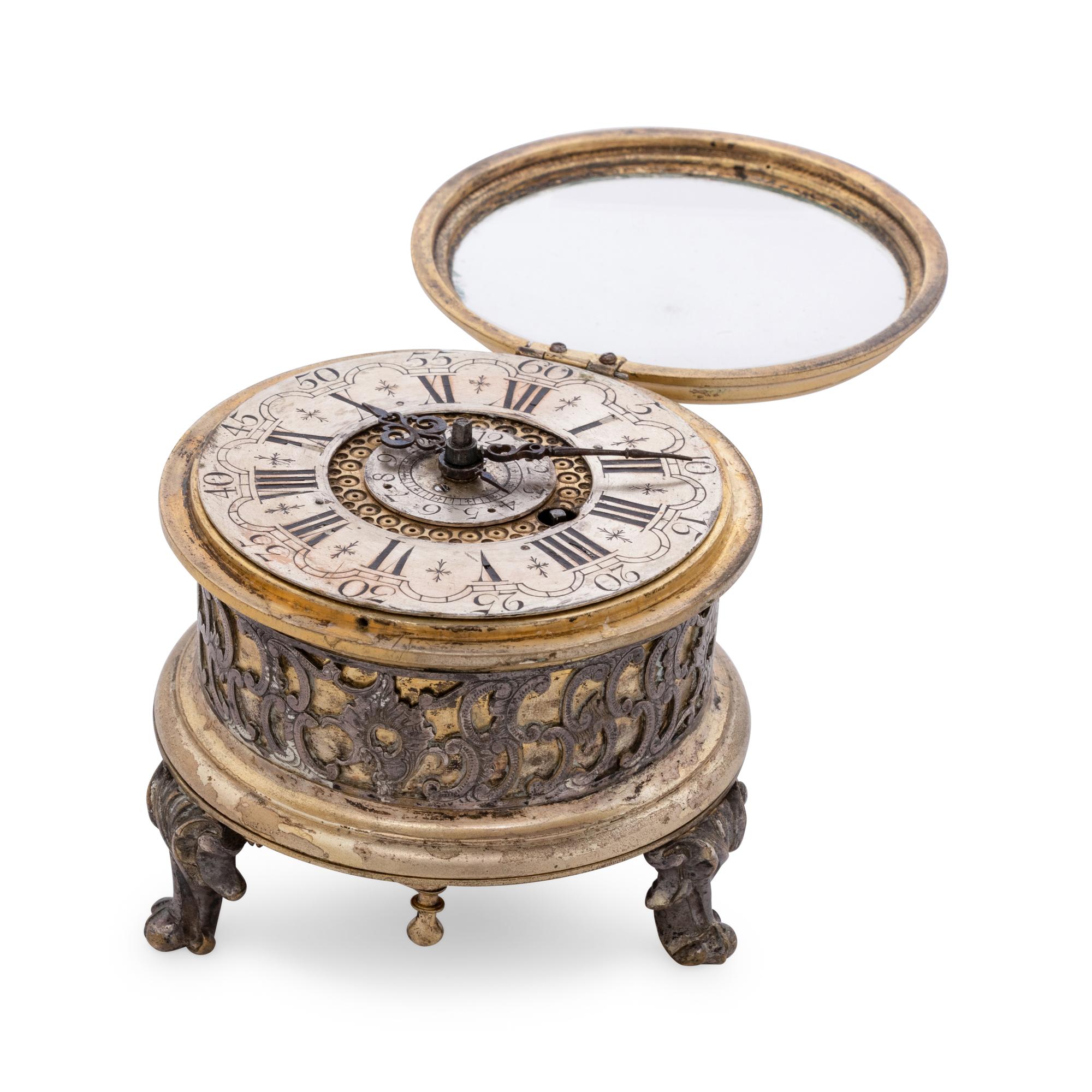 A German Gilt Metal and Silvered Brass Table Clock