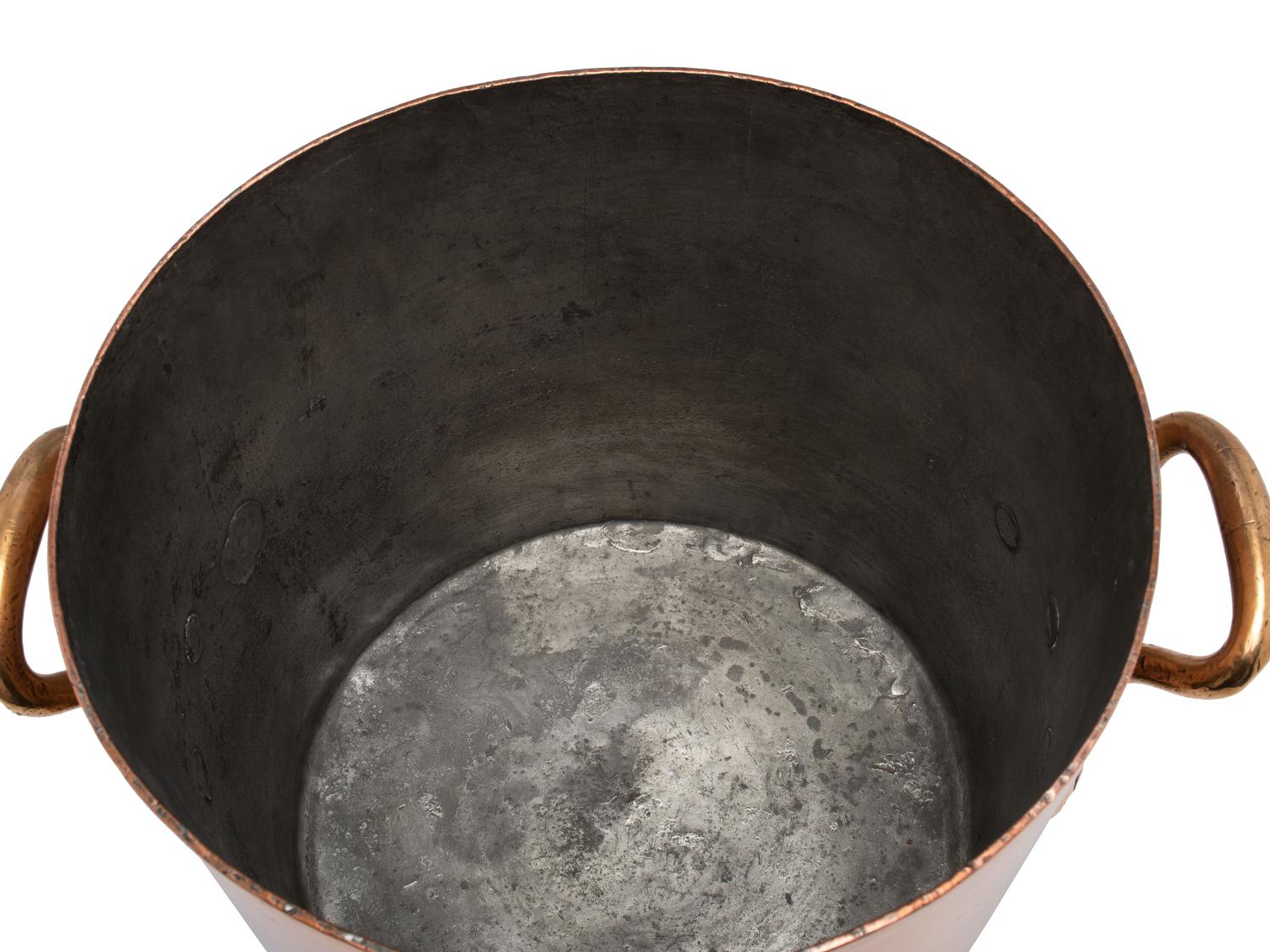 A French Copper Stock Pot with Brass Handles