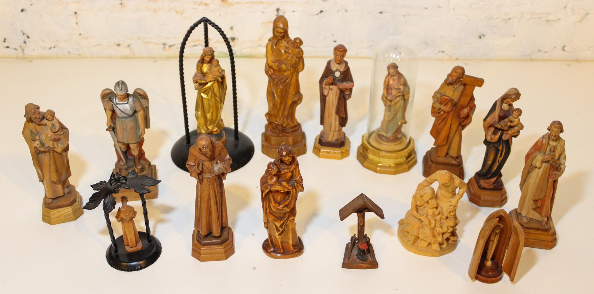 Fifteen Ecclesiastic Carved Wood Figures. Height of tallest 8 1/2 inches.
