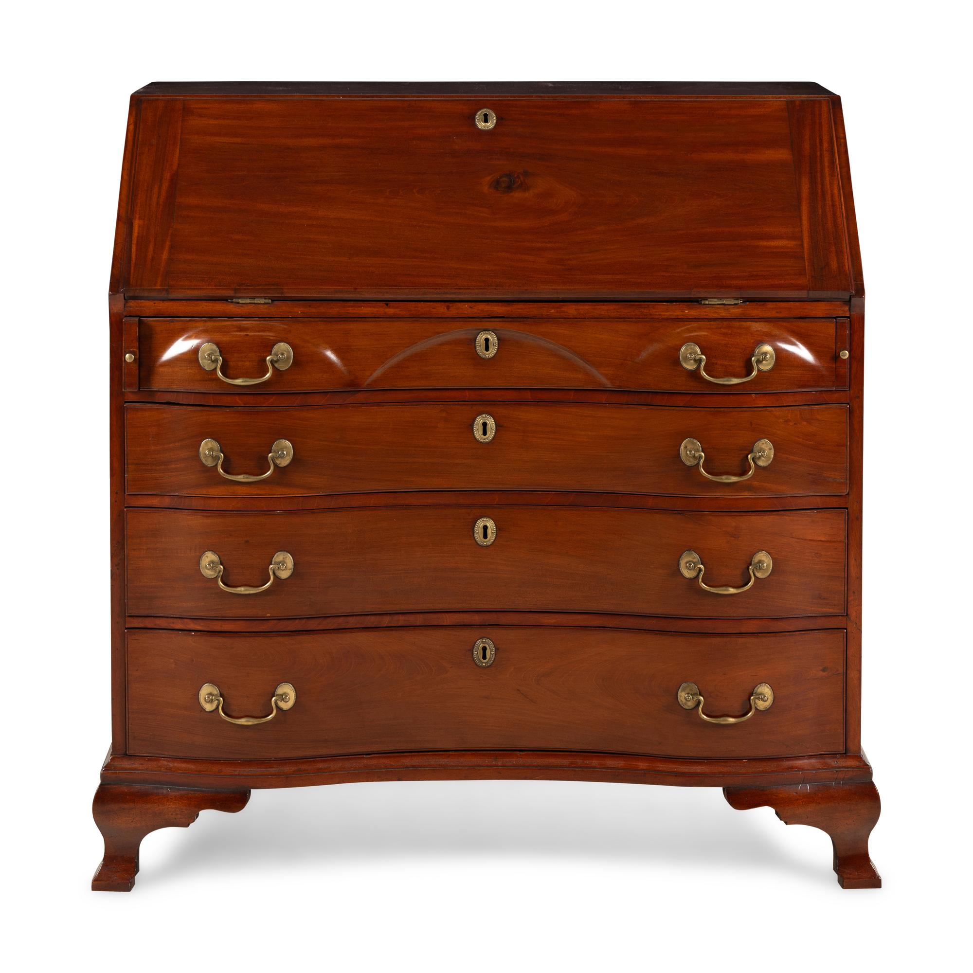 A Chippendale Walnut Serpentine Slant-Front Bureau