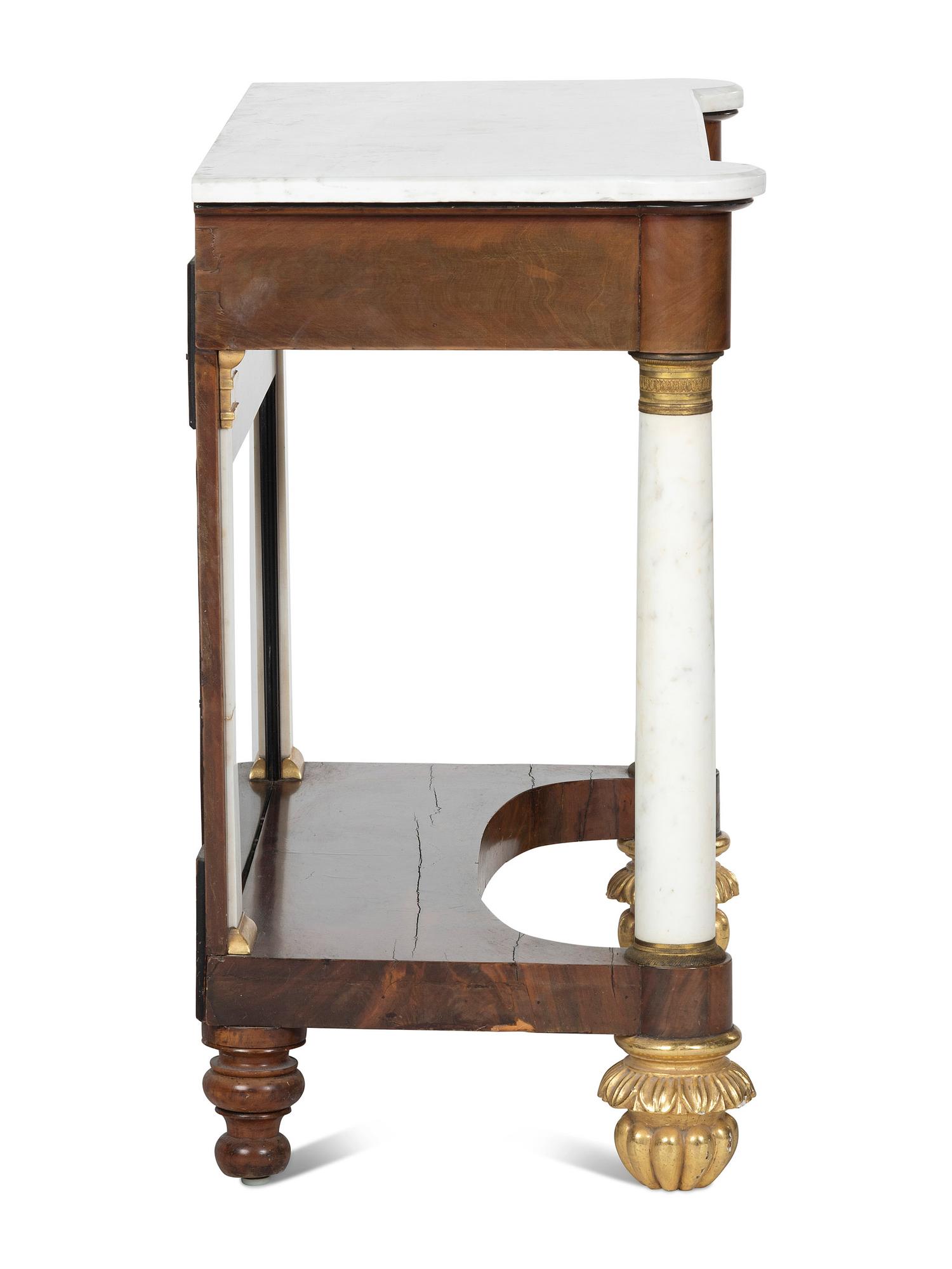 A Classical Parcel Gilt and Figured Mahogany Gilt-Metal Mounted Marble Top Pier Table