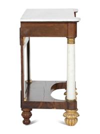 A Classical Parcel Gilt and Figured Mahogany Gilt-Metal Mounted Marble Top Pier Table