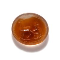 A Roman Carnelian Ring Stone with a Goatherder Milking a Goat