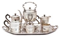 An Eight Piece Silver Plate Tea Service Length of tray 28 inches. — 20TH CENTURY