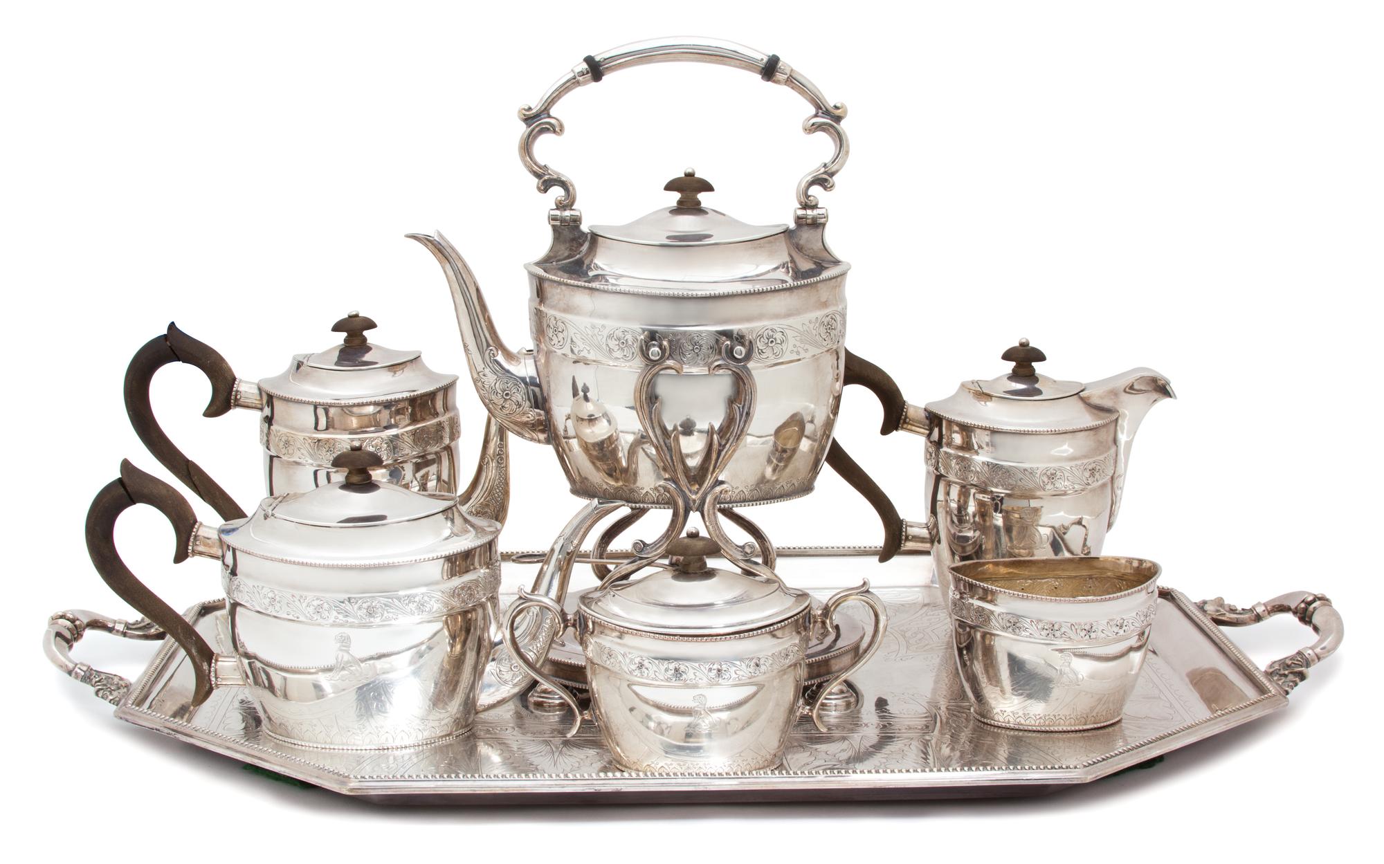 An Eight Piece Silver Plate Tea Service Length of tray 28 inches. — 20TH CENTURY