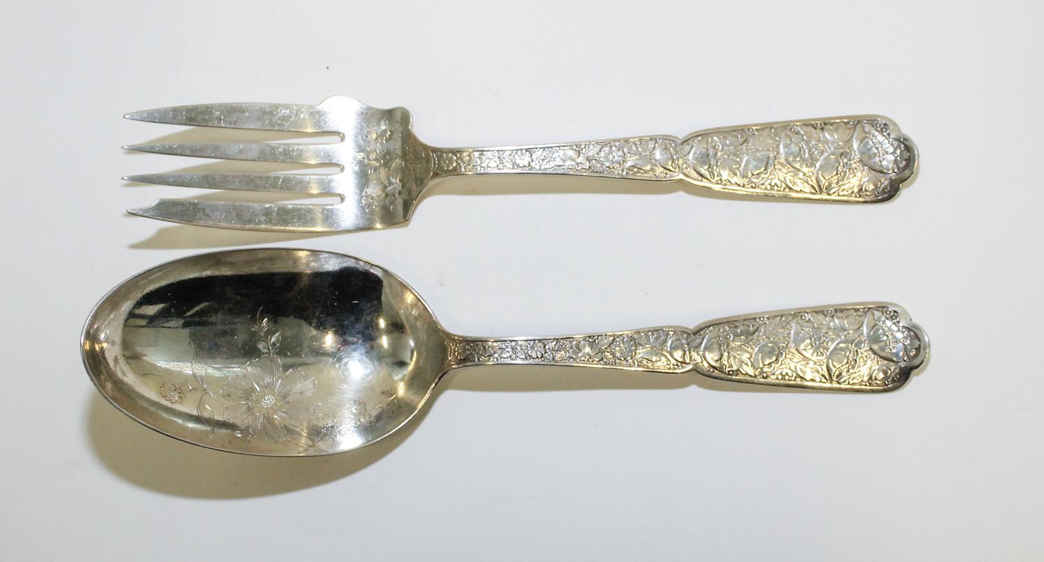 Two American Silver Serving Articles, Wood & Hughes, New York, NY, Late 19th century, in the Poppy pattern, comprising a cold meat fork