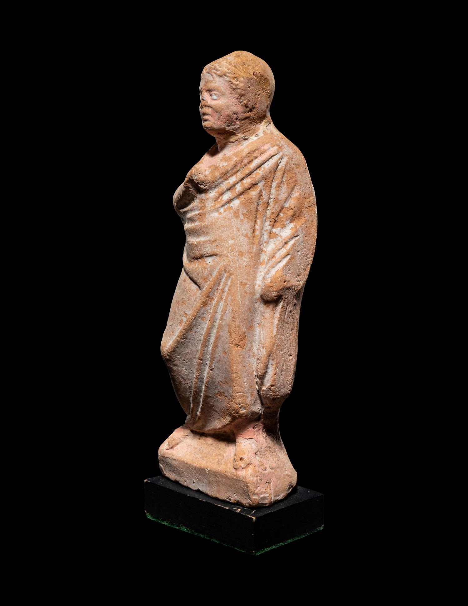 A Greek Terra Cotta Draped Female Figure