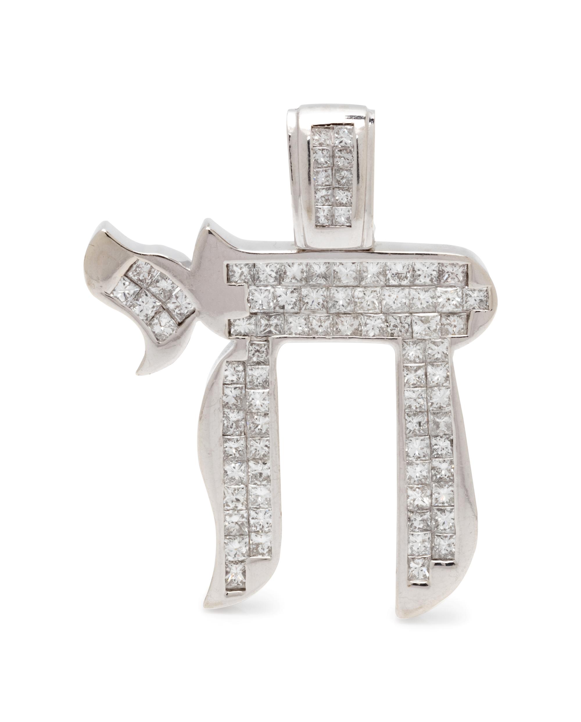 A 14 Karat White Gold and Diamond Chai Pendant,