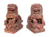 A Pair of Chinese Red and Gold Painted Carved Wood Foo Lions Height 10 1/4 inches. — 19TH CENTURY