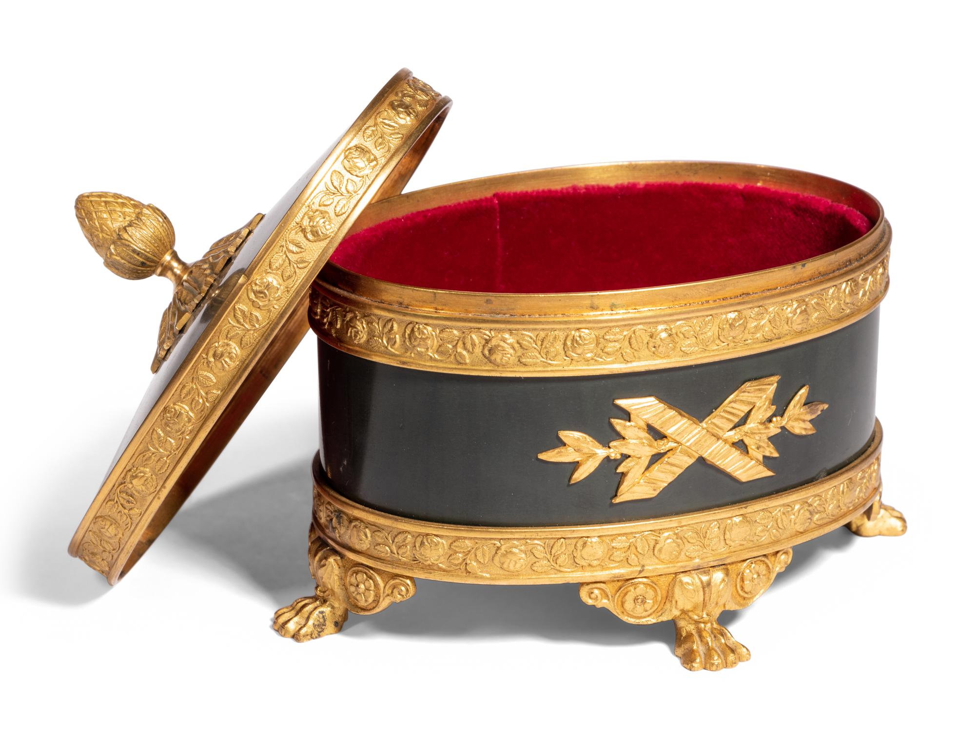 An English Silver Box, an Italian Gilt Metal Box and a Patinated Metal Table Casket