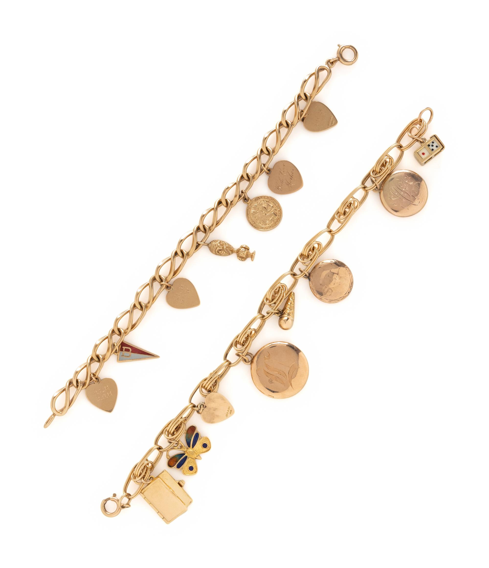 COLLECTION OF YELLOW GOLD CHARM BRACELETS