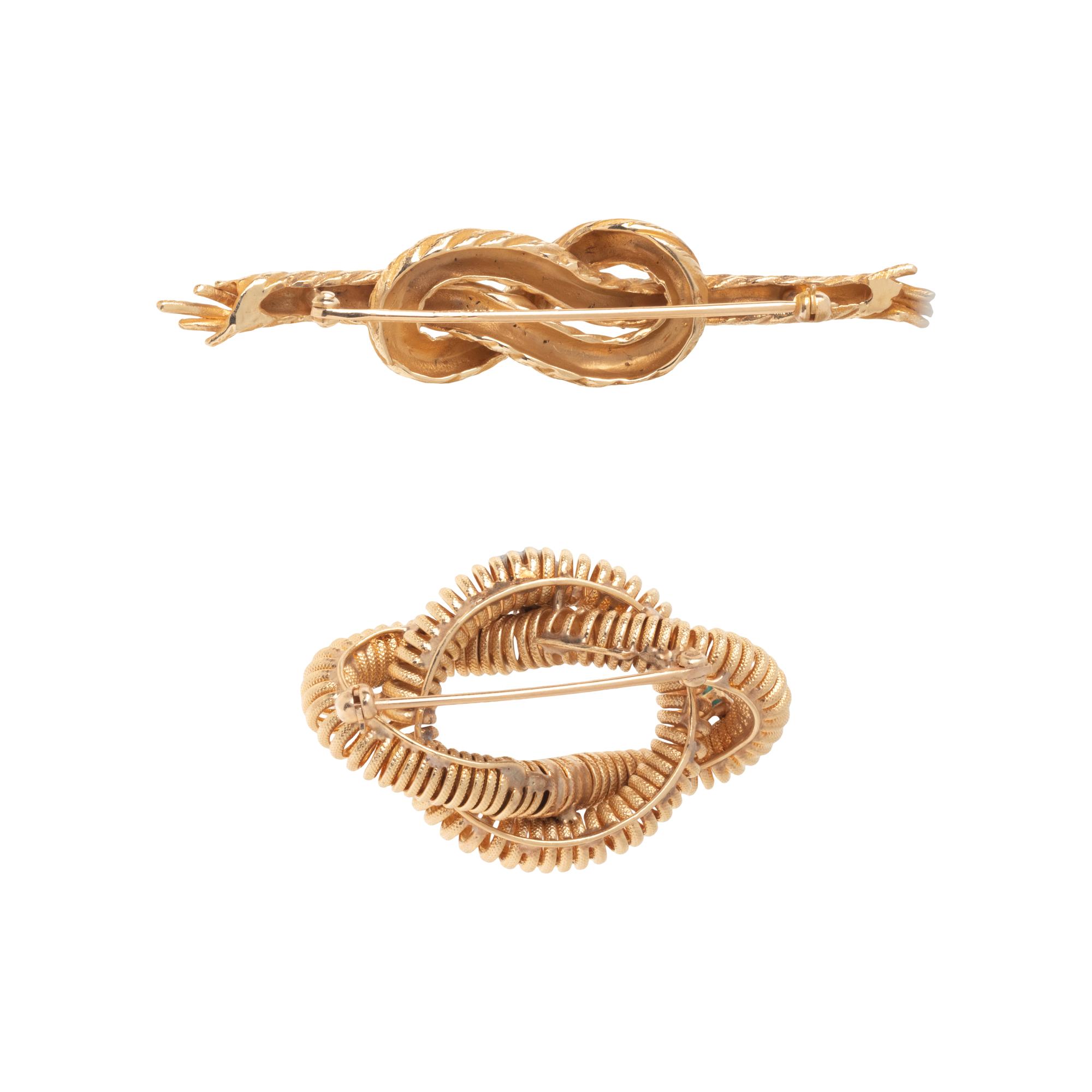 TWO YELLOW GOLD KNOT BROOCHES