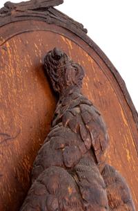 A Black Forest Carved Game Plaque