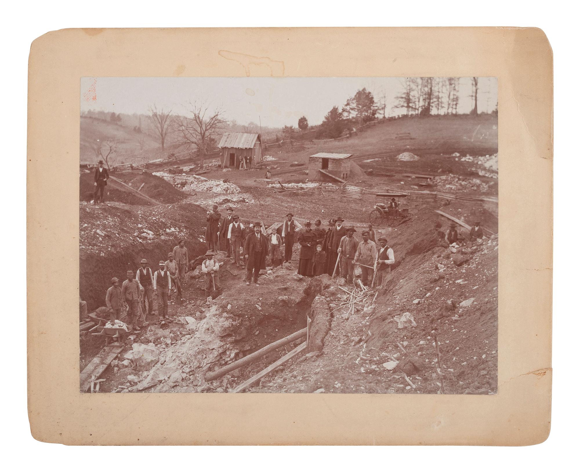 [EARLY PHOTOGRAPHY] -- [OCCUPATIONAL]. Photograph of African American men working in a rock quarry or mine.