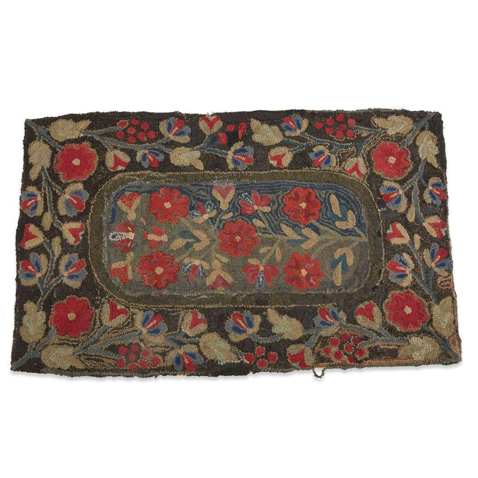Two floral hooked rugs late 19th/early 20th century