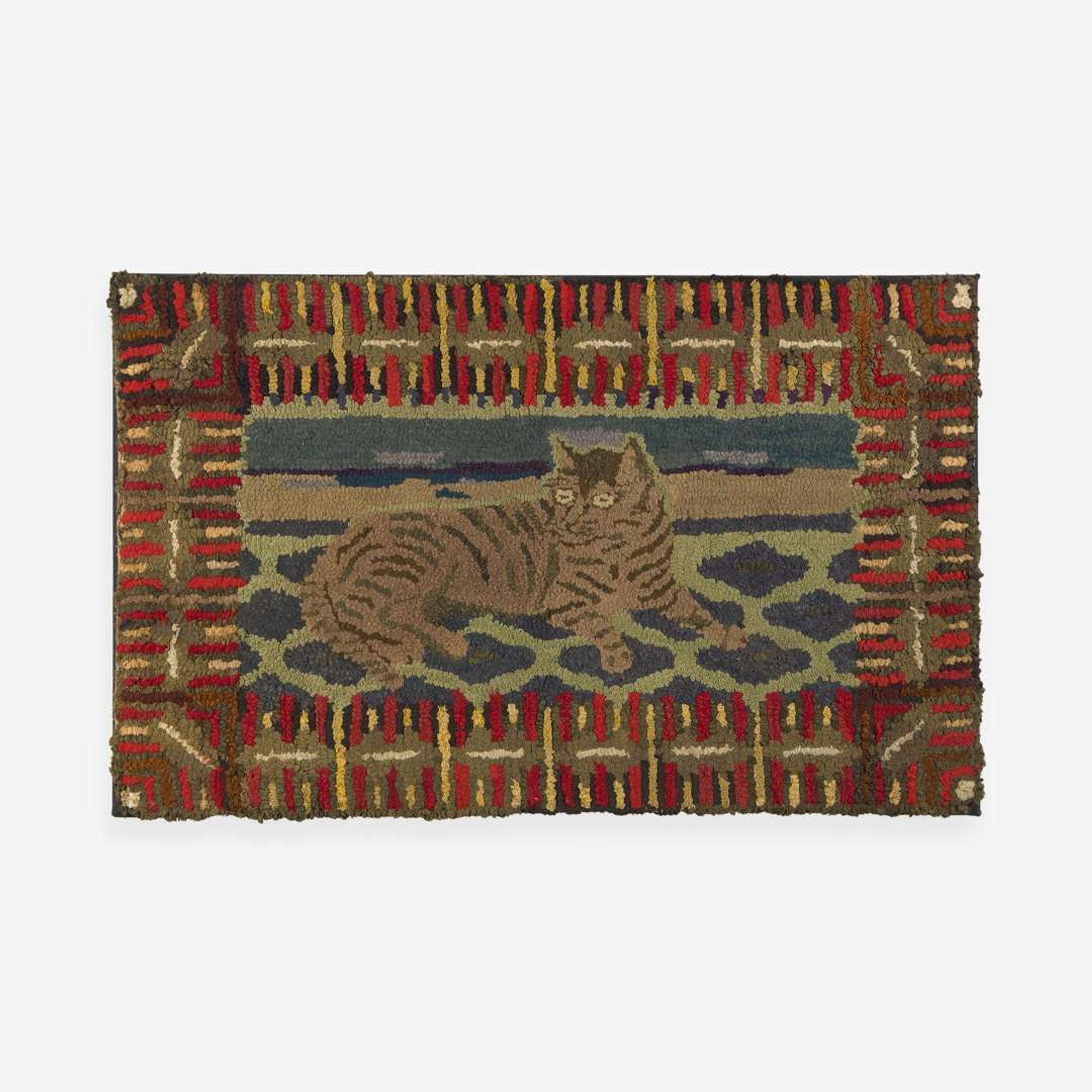 A pictorial hooked rug with reclining cat early 20th century