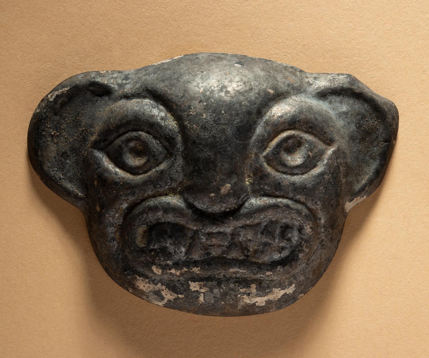 Two Moche Copper Masks
