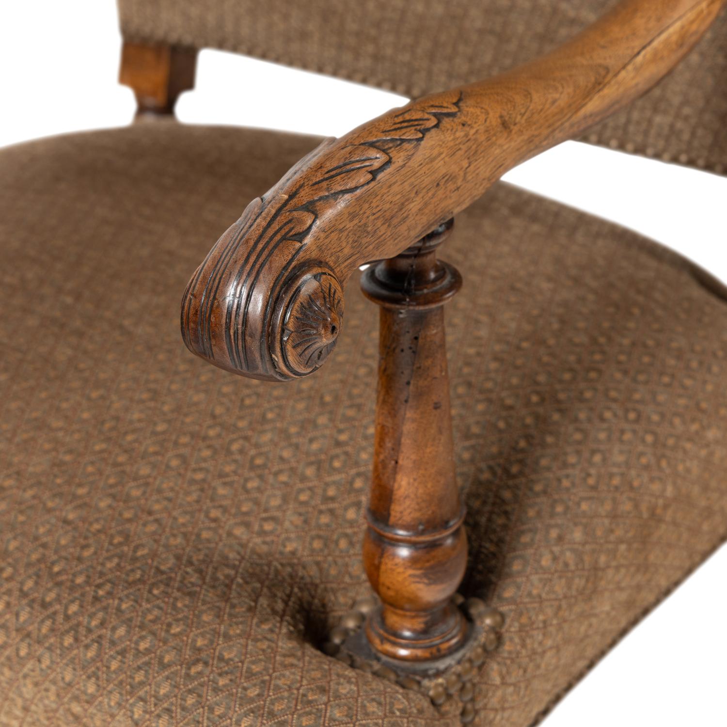 A Near Pair of Continental Baroque Style Walnut Armchairs