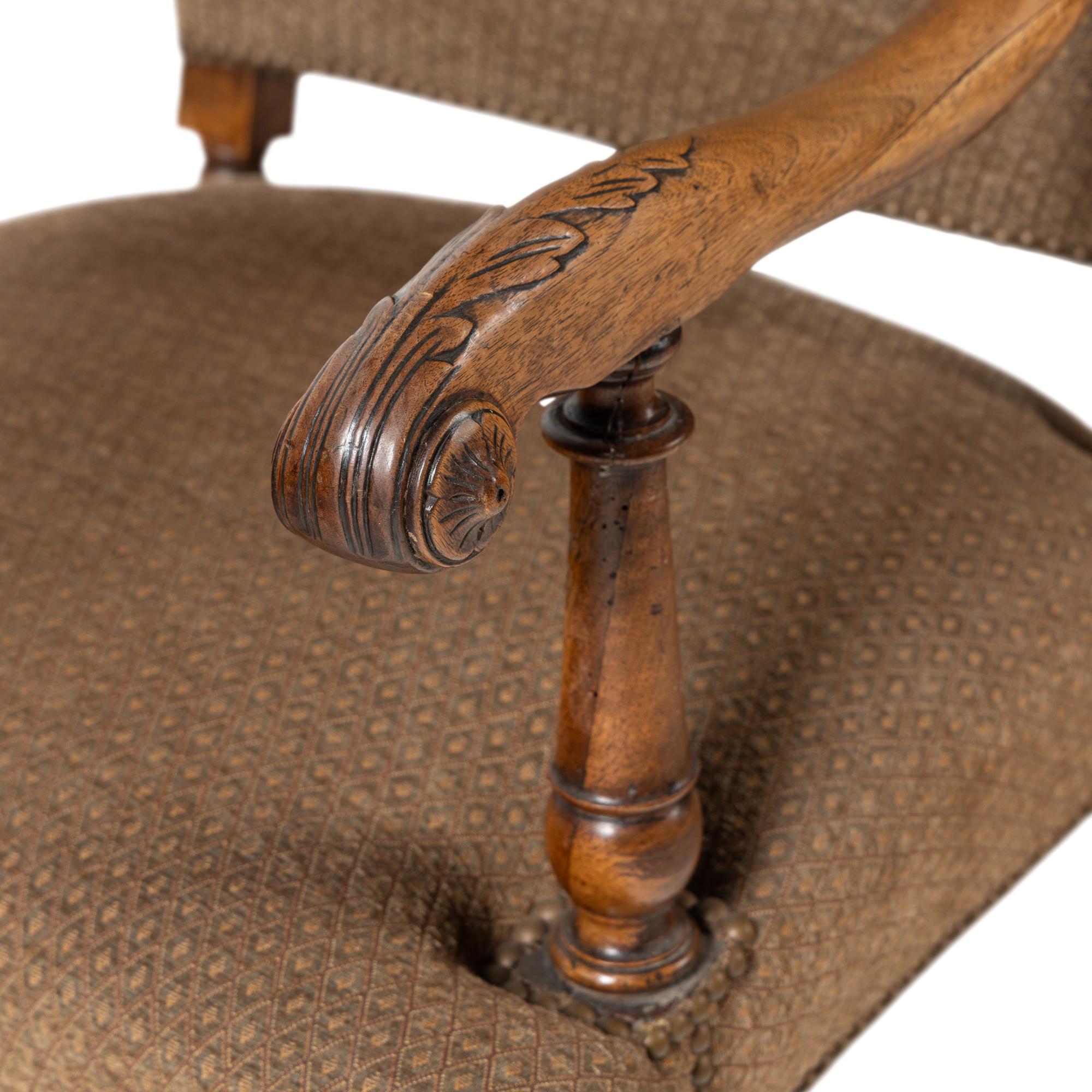 A Near Pair of Continental Baroque Style Walnut Armchairs