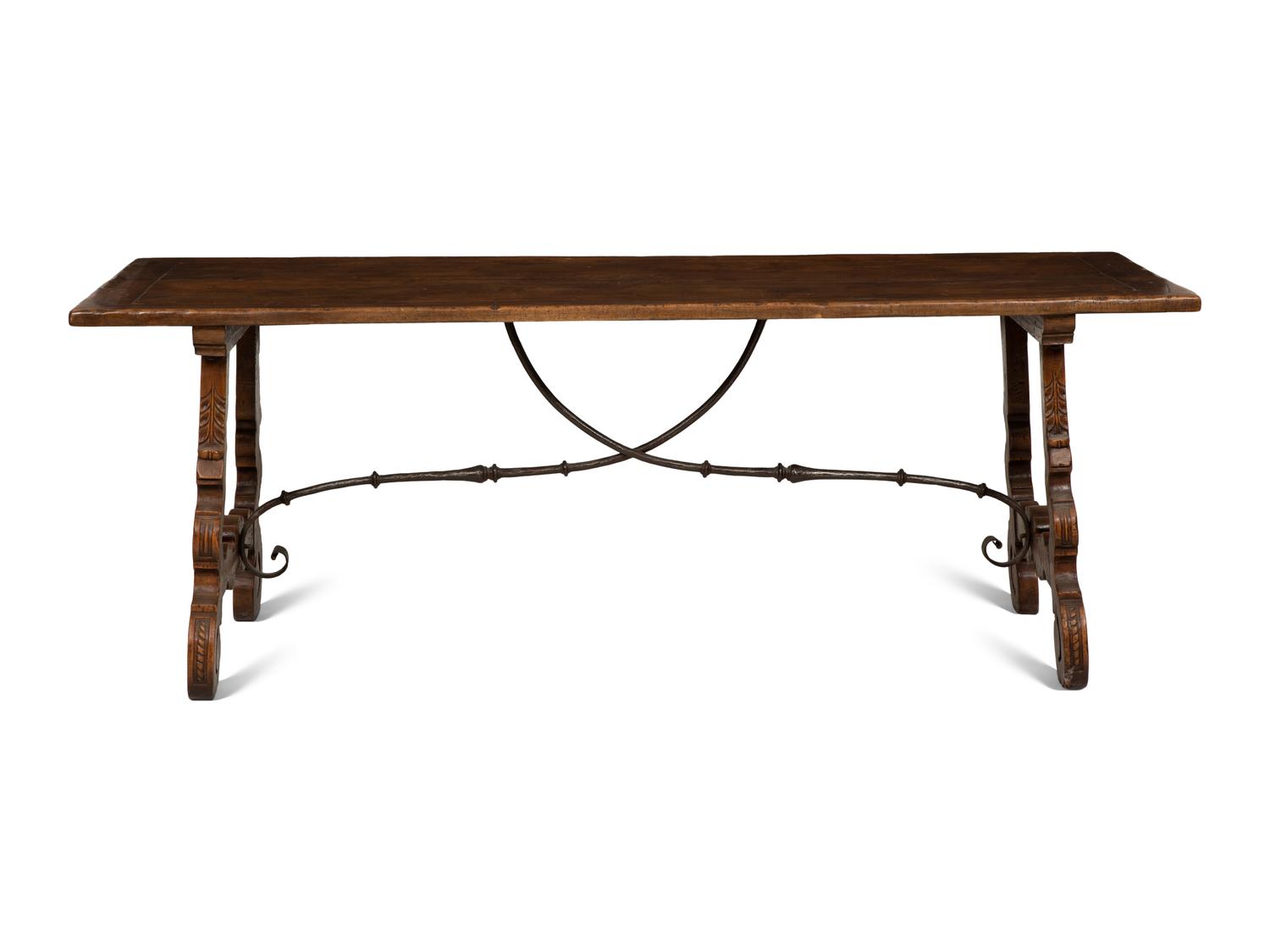 A Spanish Walnut and Wrought Iron Trestle Table