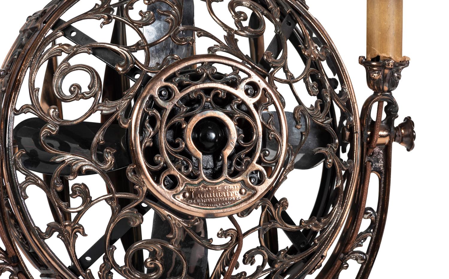 A Luminaire Cast and Patinated Metal Two-Light Funeral Parlor Fan