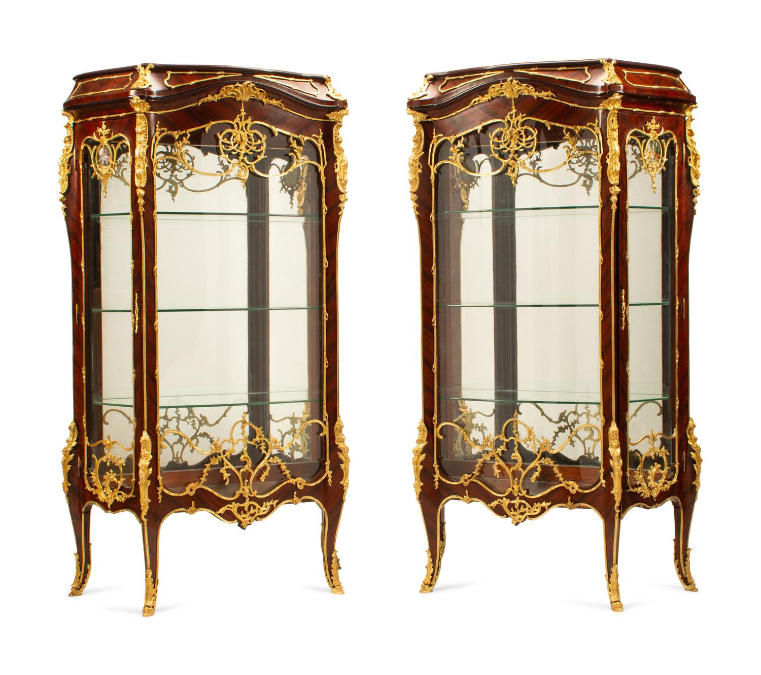 A Pair of Louis XV Style Gilt Bronze Mounted Vitrine Cabinets