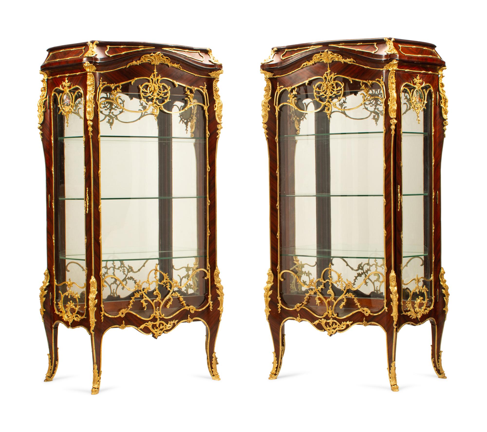 A Pair of Louis XV Style Gilt Bronze Mounted Vitrine Cabinets