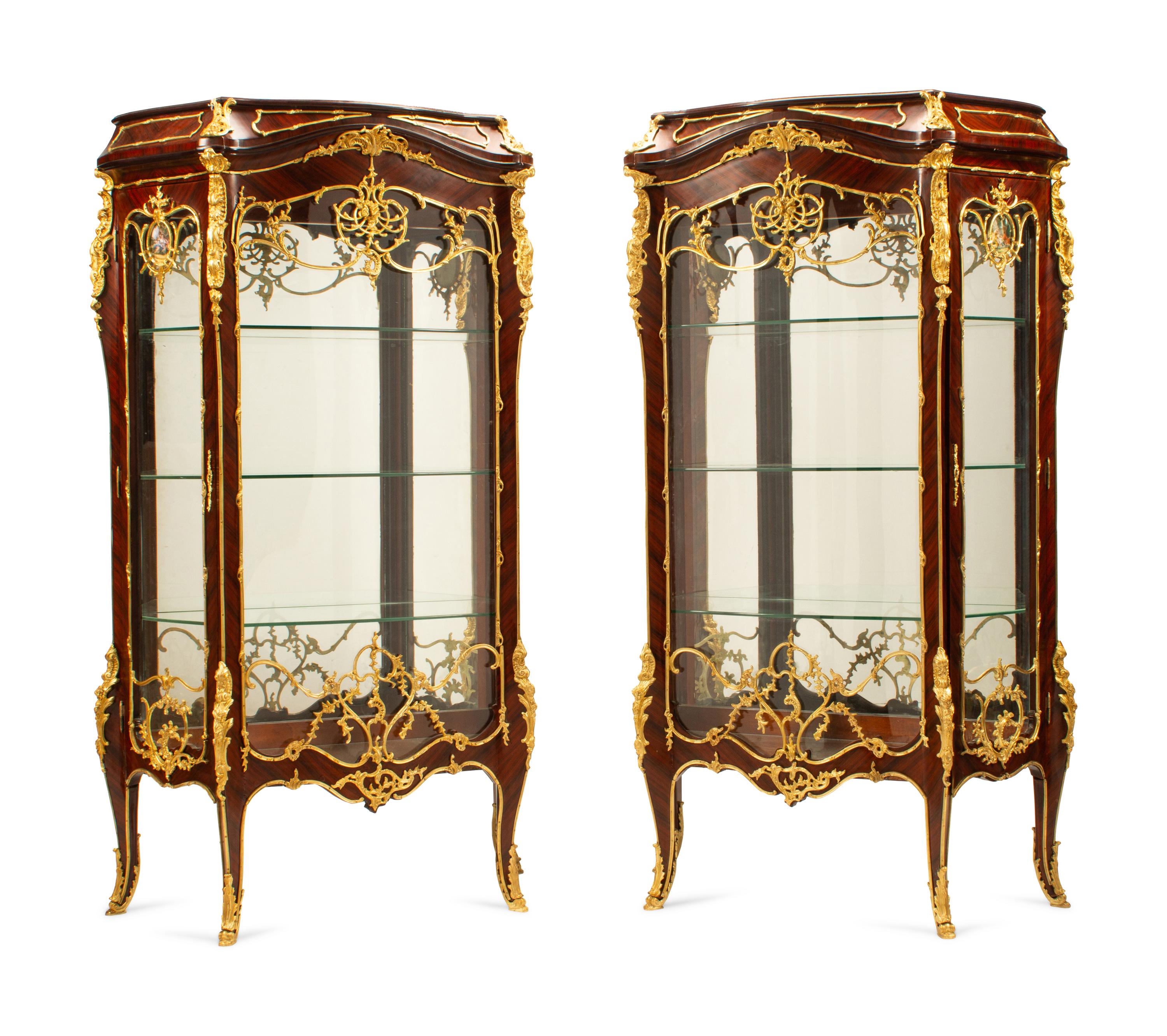 A Pair of Louis XV Style Gilt Bronze Mounted Vitrine Cabinets