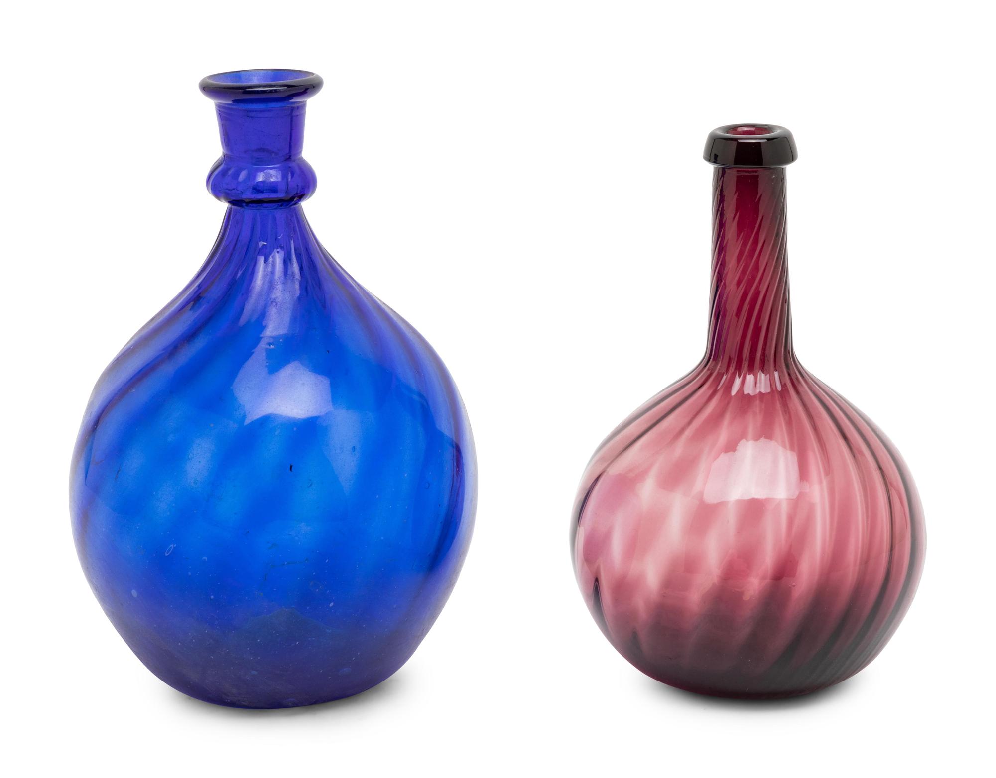 Two American Colored and Spiraled Glass Bottles