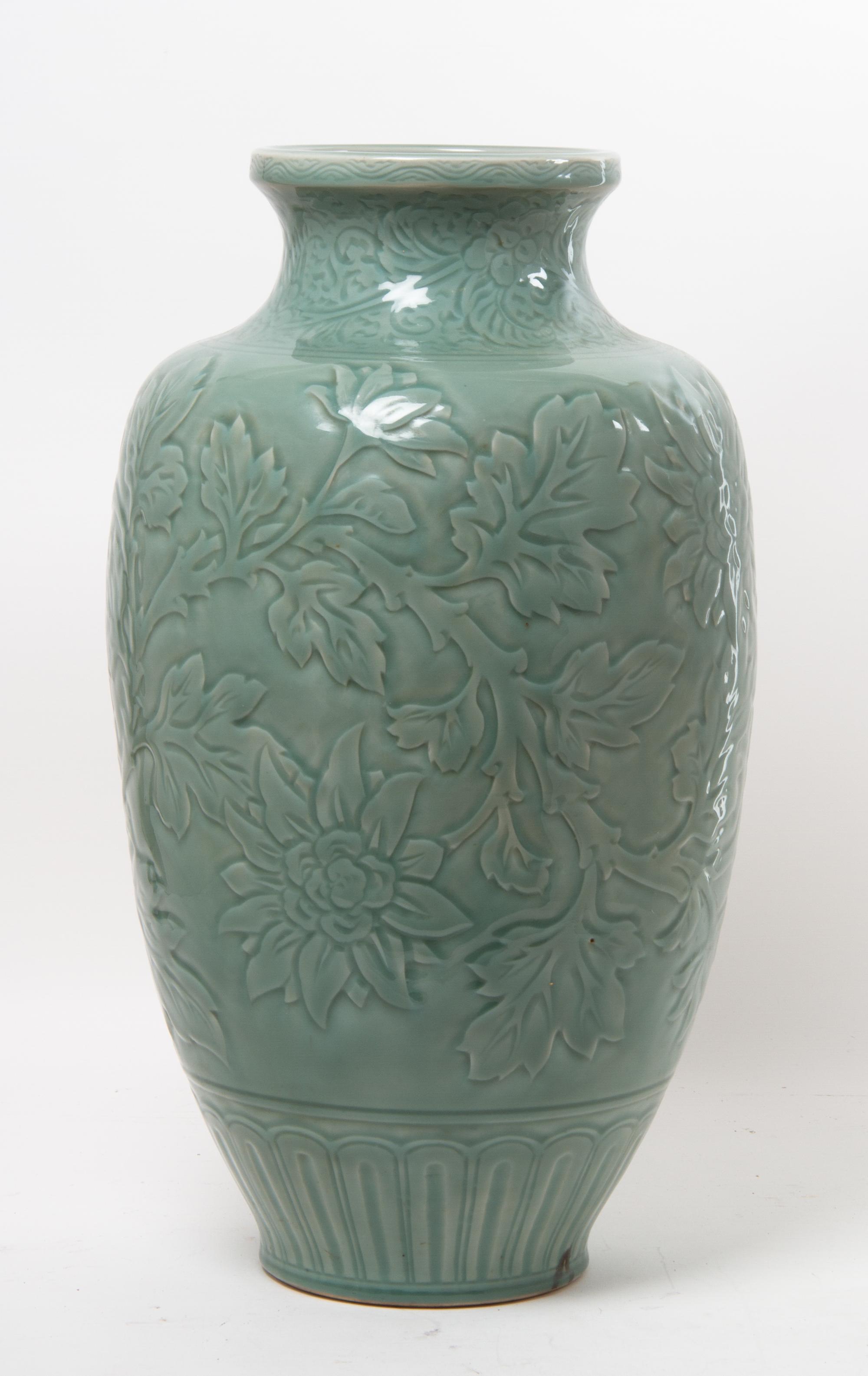 A Celadon Glazed Porcelain Floor Vase. Height 24 inches.