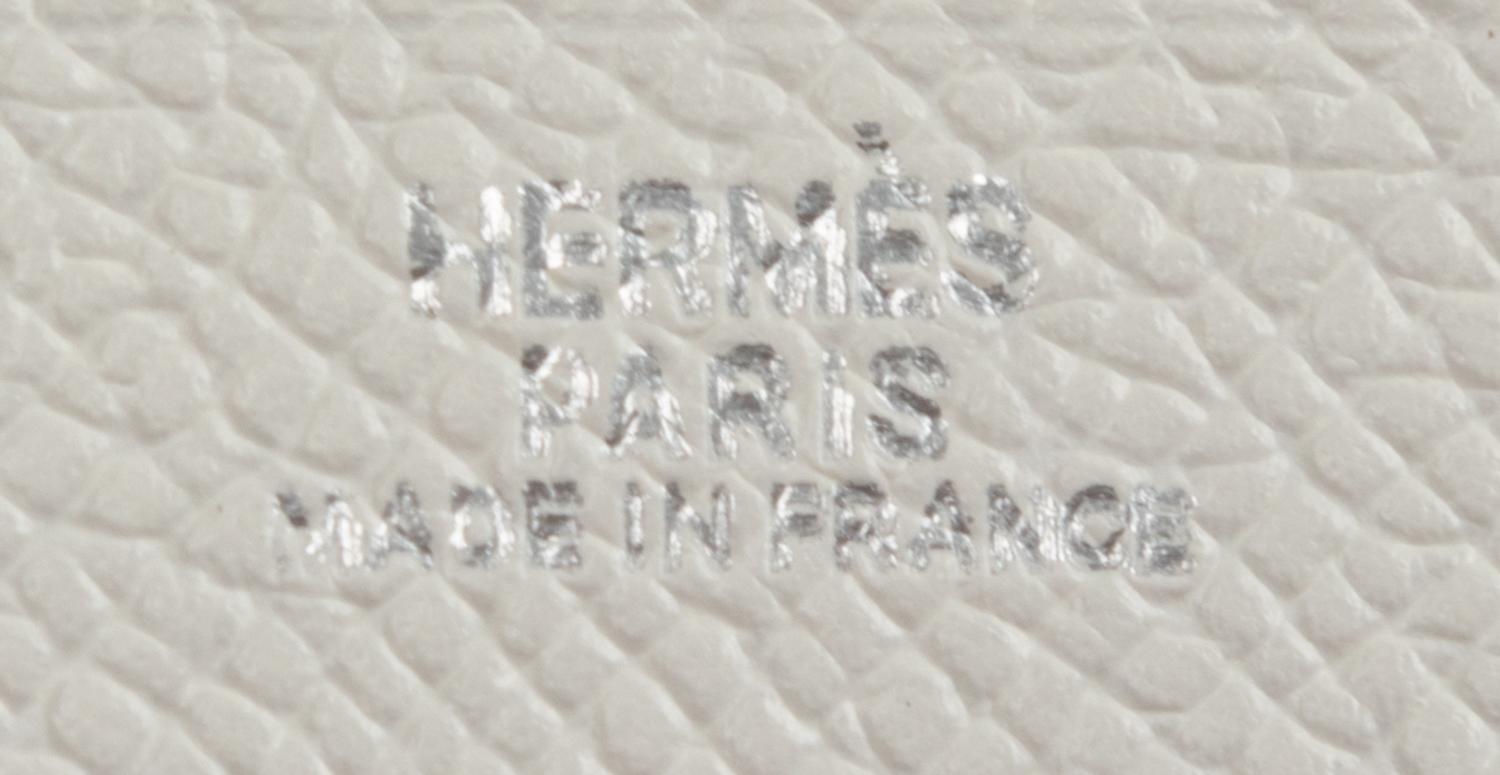 Three Hermès Items: One Ostrich Folio and Two Leather Zip Wallets, 2000-2008