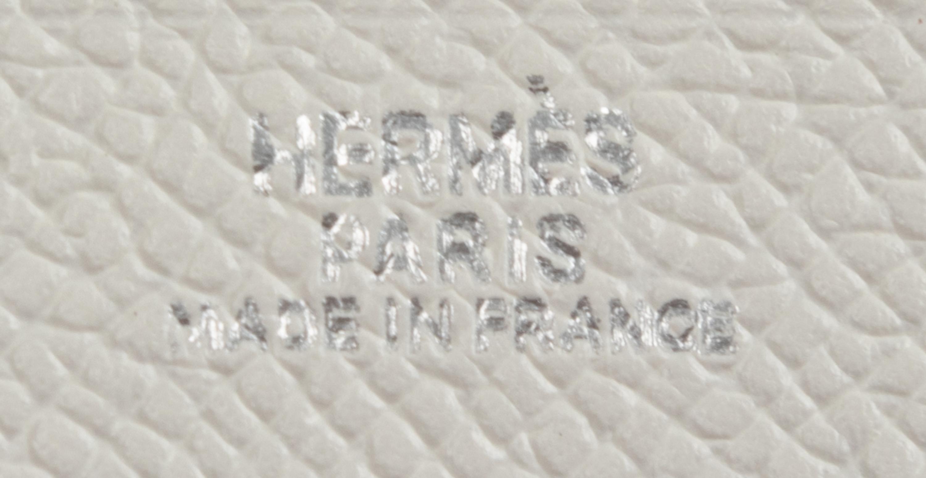 Three Hermès Items: One Ostrich Folio and Two Leather Zip Wallets, 2000-2008