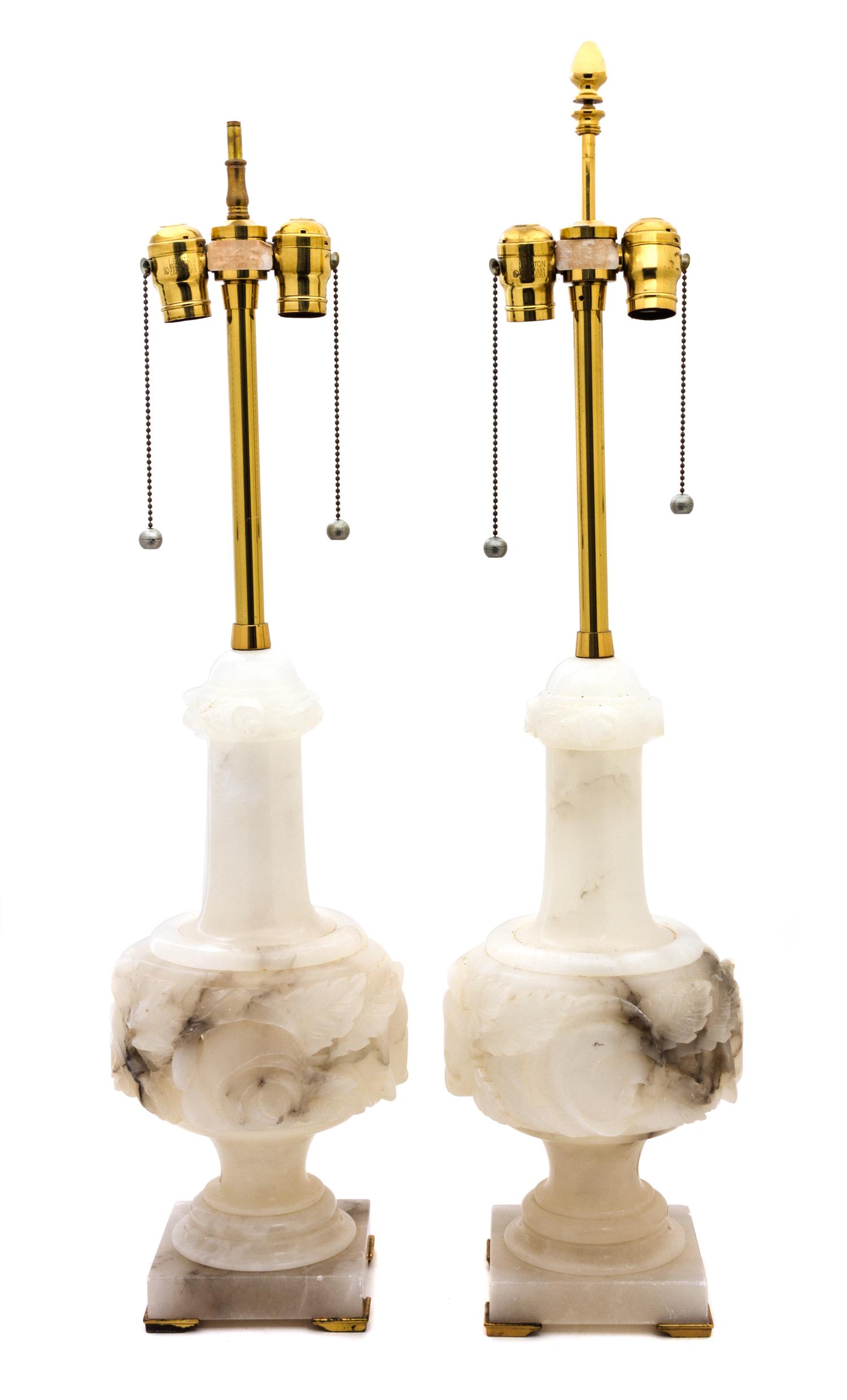 A Pair of Carved Alabaster Table Lamps Height overall 33 inches, height of alabaster 17 1/2 inches. — 20TH CENTURY