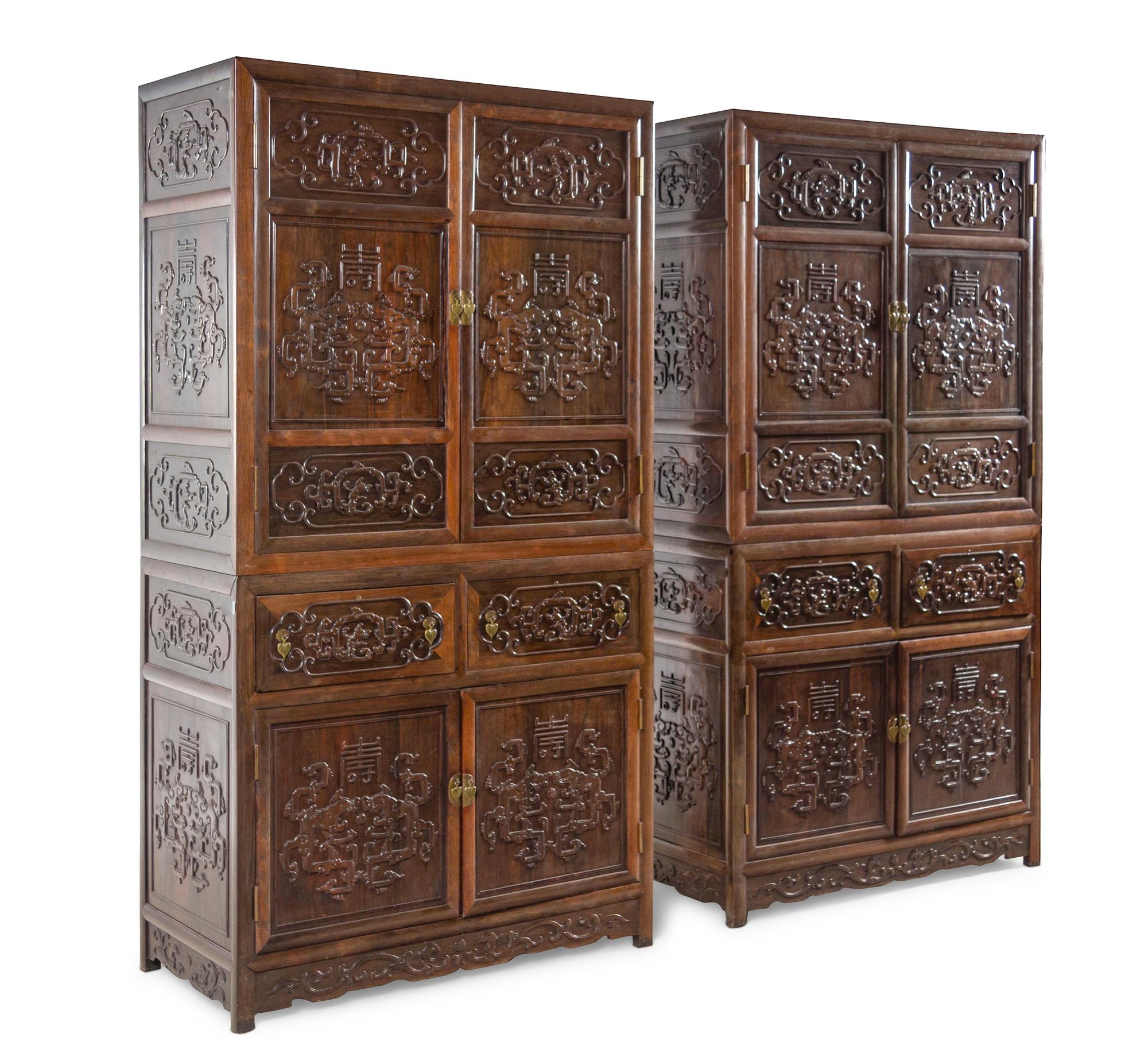 A Pair of Chinese Export Carved Hardwood Cabinets